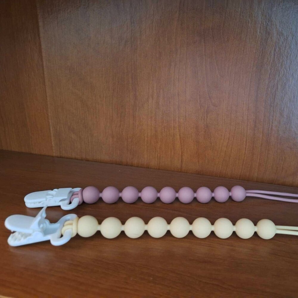 New! 2 Silicone Pacifiers Holders, Rose(ish) and Yellow(ish)